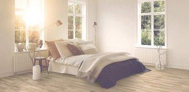 A bed in a room Description automatically generated